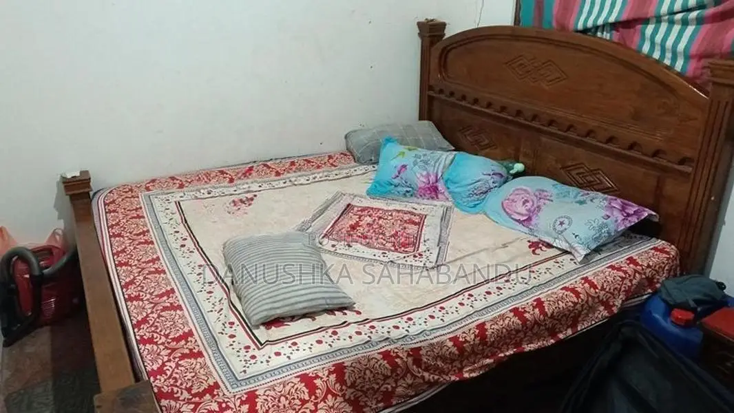 teak king size bed with spring mattress