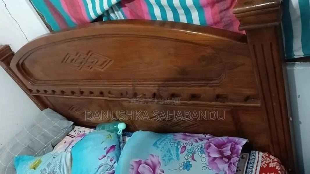 teak king size bed with spring mattress