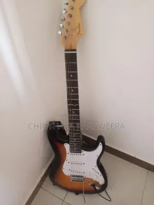 Electric guitar with amplifier