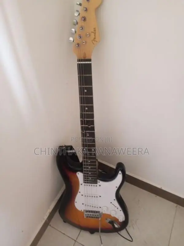 Electric guitar with amplifier