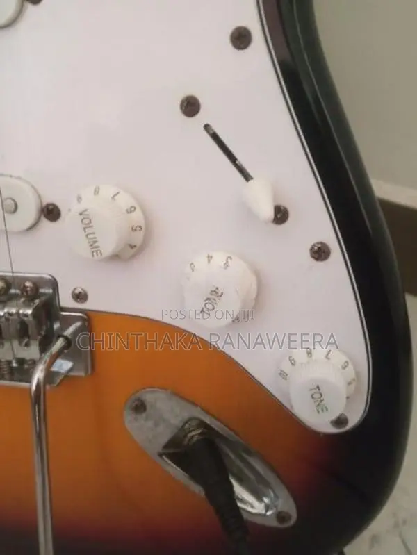 Electric guitar with amplifier