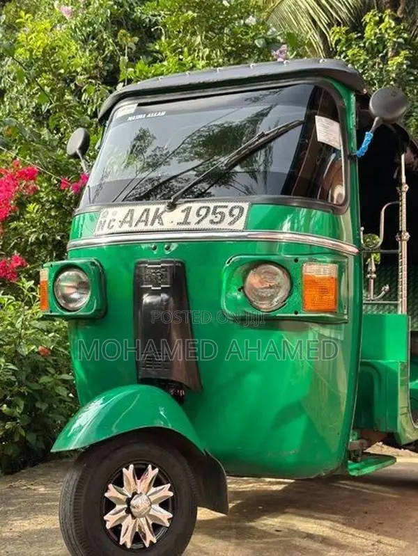 Bajaj RE 2013