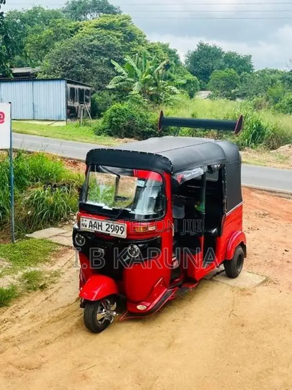 Bajaj RE 2013