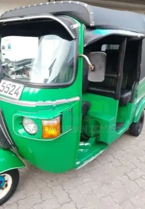 Bajaj RE 2013