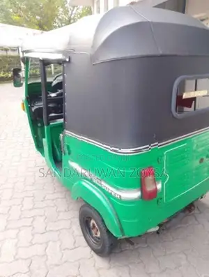 Bajaj RE 2013