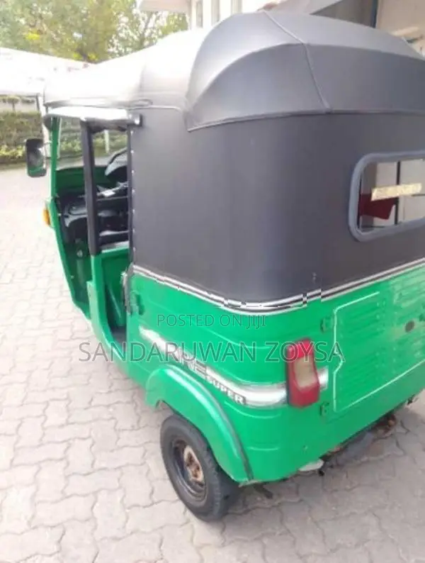 Bajaj RE 2013