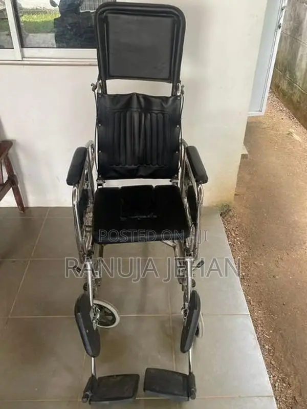 Full option commode wheel chair