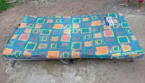 Folding Bed with Mettres