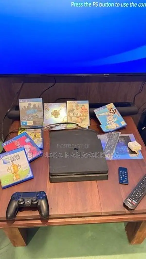 Sony Ps4 with Hisense 50" 4 K Tv {used}