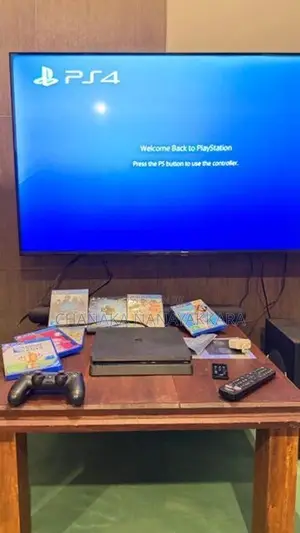 Sony Ps4 with Hisense 50" 4 K Tv {used}