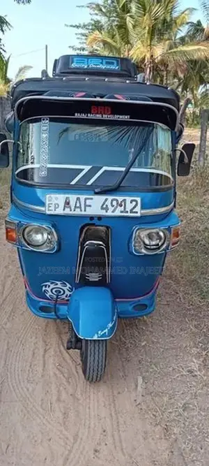 Bajaj RE 2013