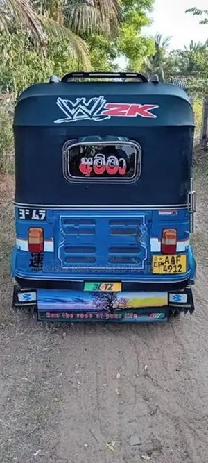 Bajaj RE 2013
