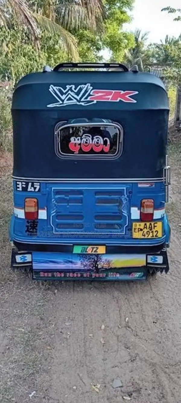 Bajaj RE 2013