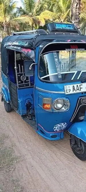 Bajaj RE 2013