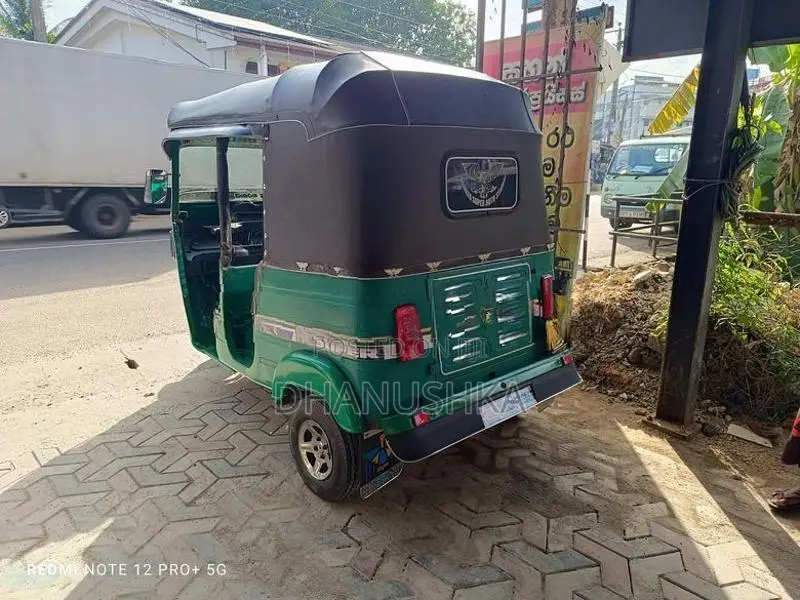 Bajaj RE 2014