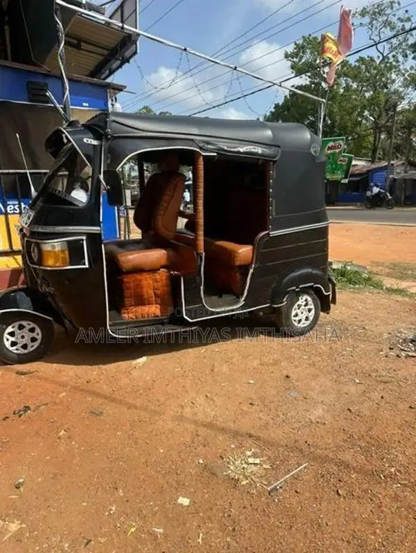 Bajaj RE 2013