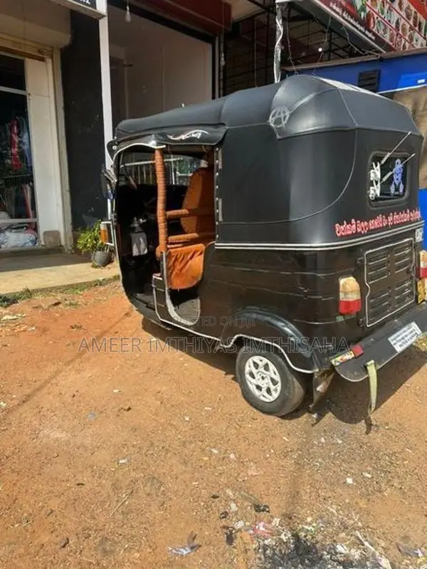 Bajaj RE 2013
