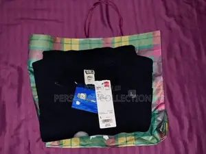 Unisex KAWS x Uniqlo Oversized Sweatshirt