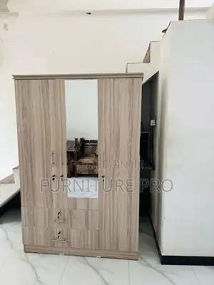 New 3 Door Melamine Cupboard .