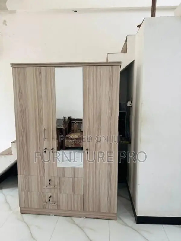 New 3 Door Melamine Cupboard .