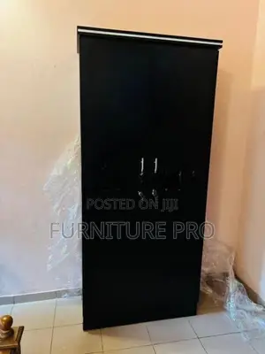 New 2 Door Black Melamine Cupboard .
