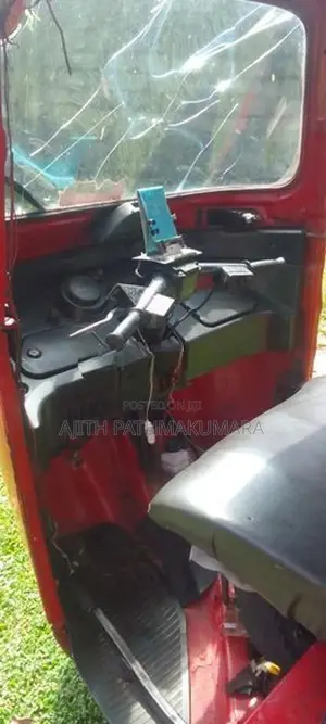 Bajaj RE 4 stroke 2015