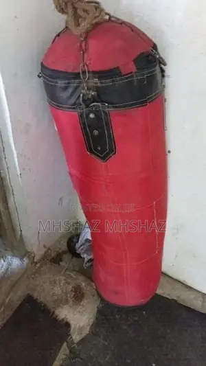 Kik Boxing Gloves with Rappin Bandage Punch Bag