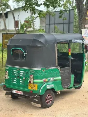 Bajaj RE 2014