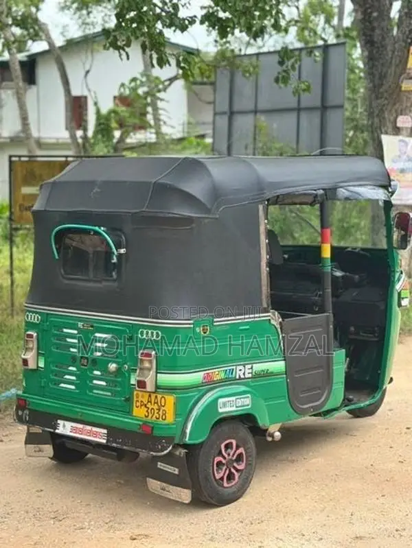 Bajaj RE 2014