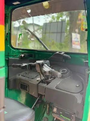 Bajaj RE 2014