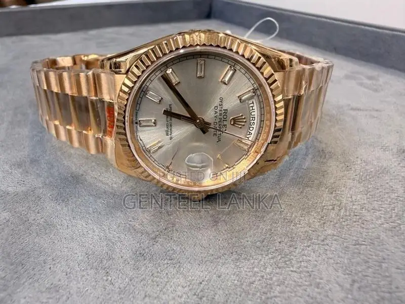 Rolex Day Date Rose Gold Watch