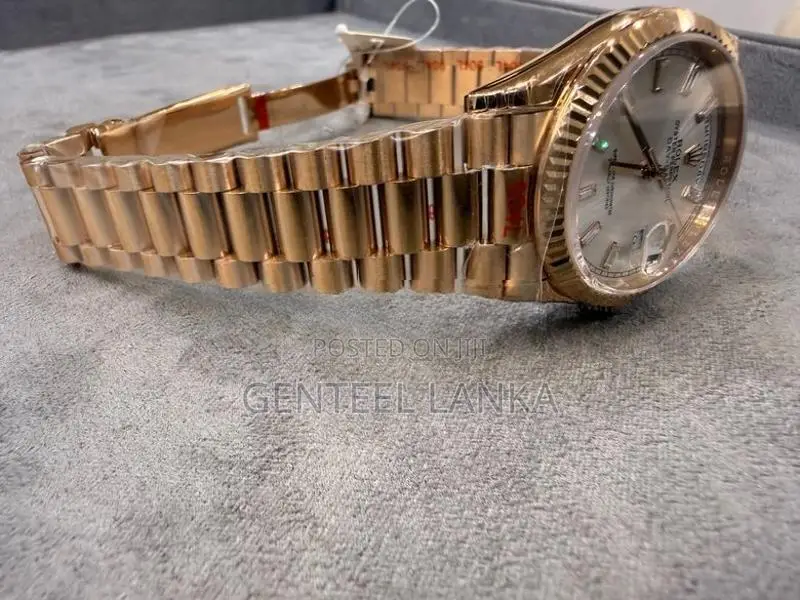 Rolex Day Date Rose Gold Watch