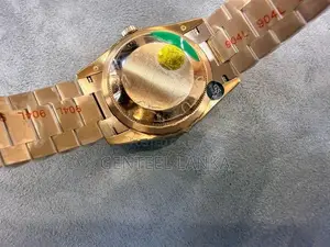 Rolex Day Date Rose Gold Watch