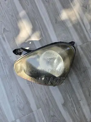 Daihatsu Mira LA300 Head lamp L