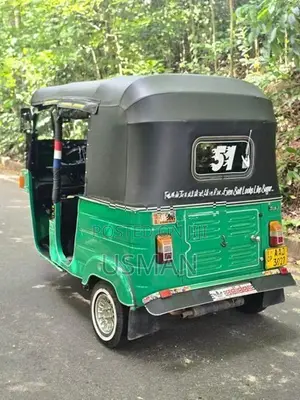 Bajaj RE 2013