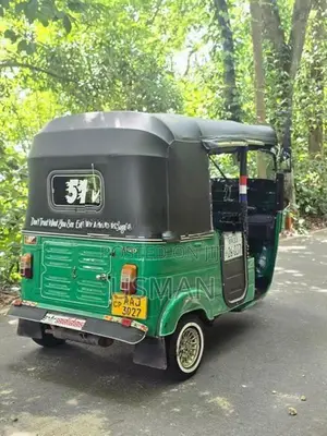Bajaj RE 2013