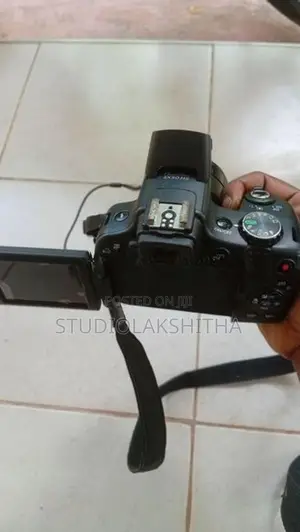 Canon PowerShot SX50 HS 50x Zoom Camera - Battery with Charger