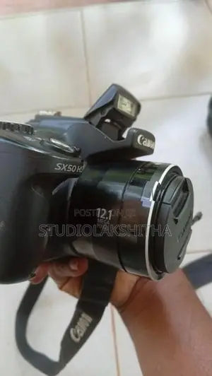 Canon PowerShot SX50 HS 50x Zoom Camera - Battery with Charger