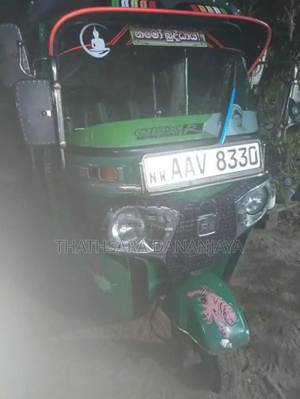 Bajaj RE 2014