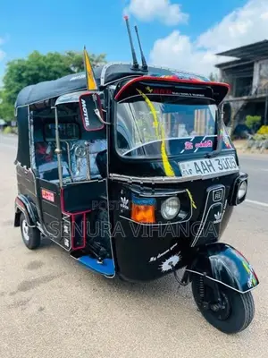 Bajaj RE 2013