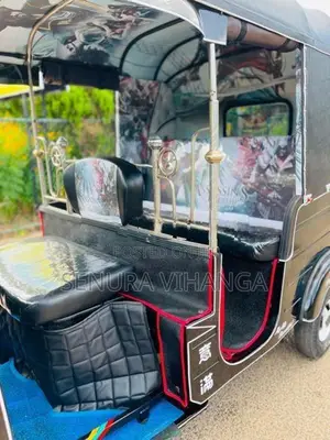 Bajaj RE 2013