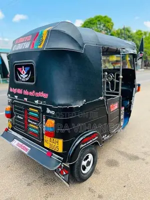 Bajaj RE 2013