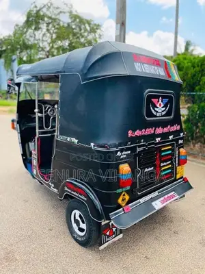 Bajaj RE 2013