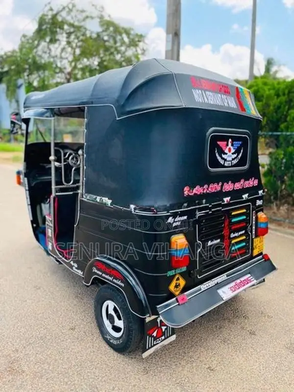 Bajaj RE 2013