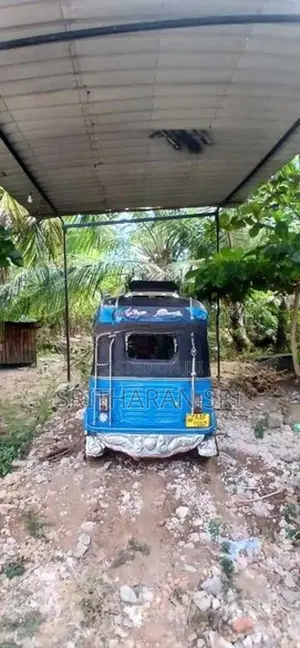 Bajaj RE 2013