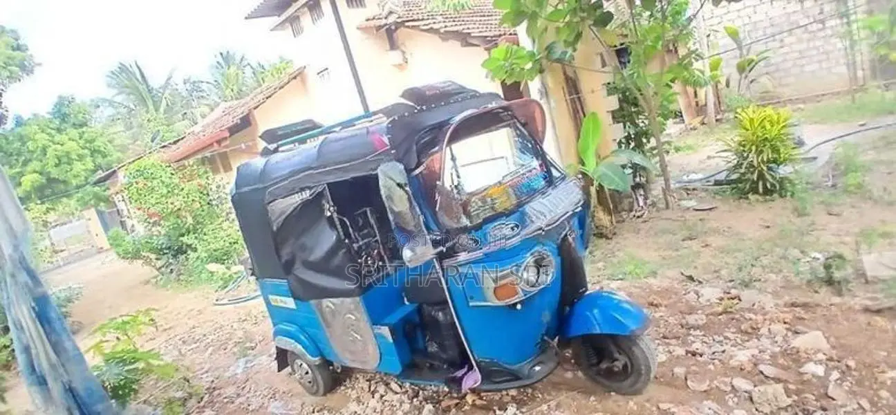 Bajaj RE 2013