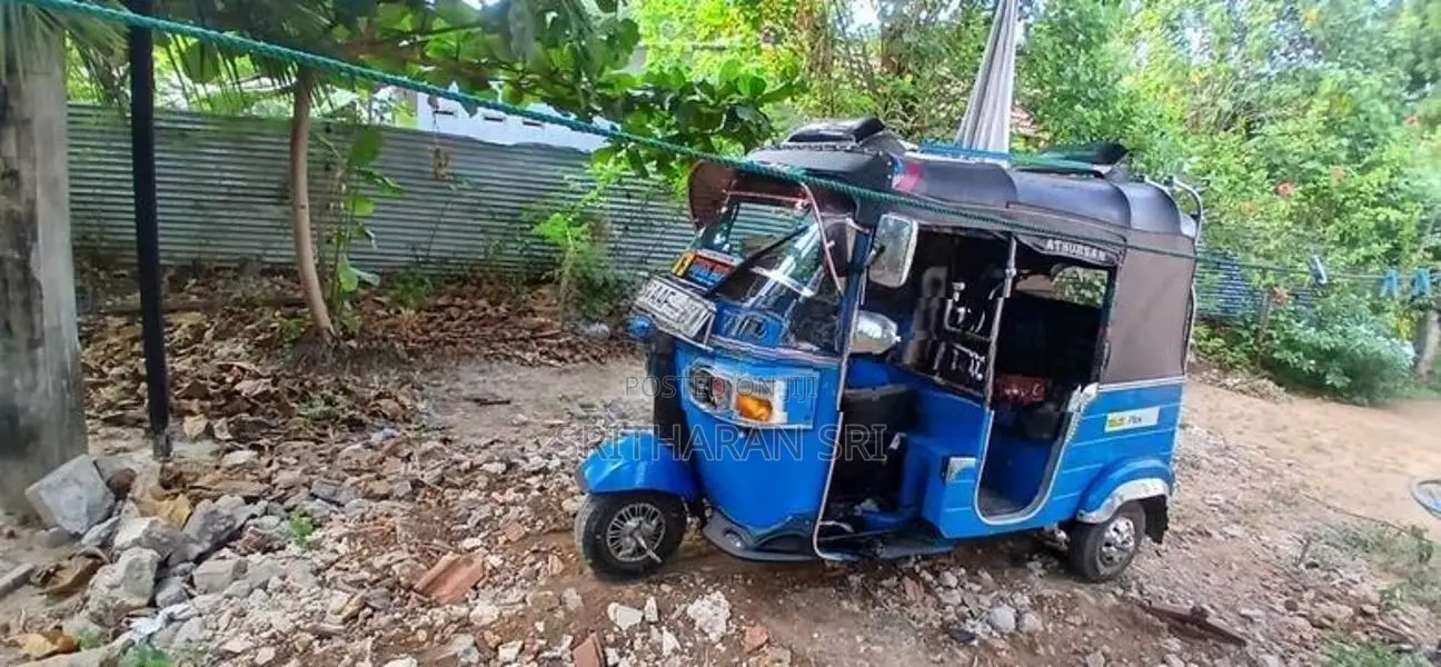 Bajaj RE 2013
