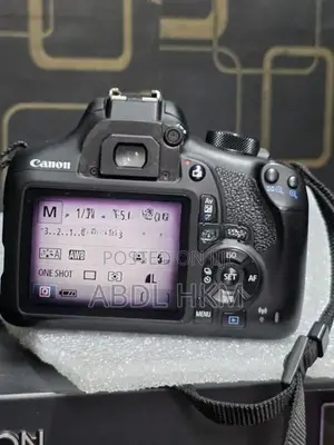 canon 1300D with lens