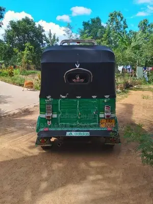 Bajaj RE 2013