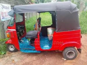 Bajaj RE 2013